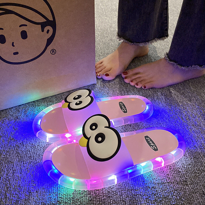 Cute slippers with cartoon motifs that glow