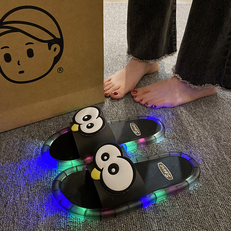 Cute slippers with cartoon motifs that glow